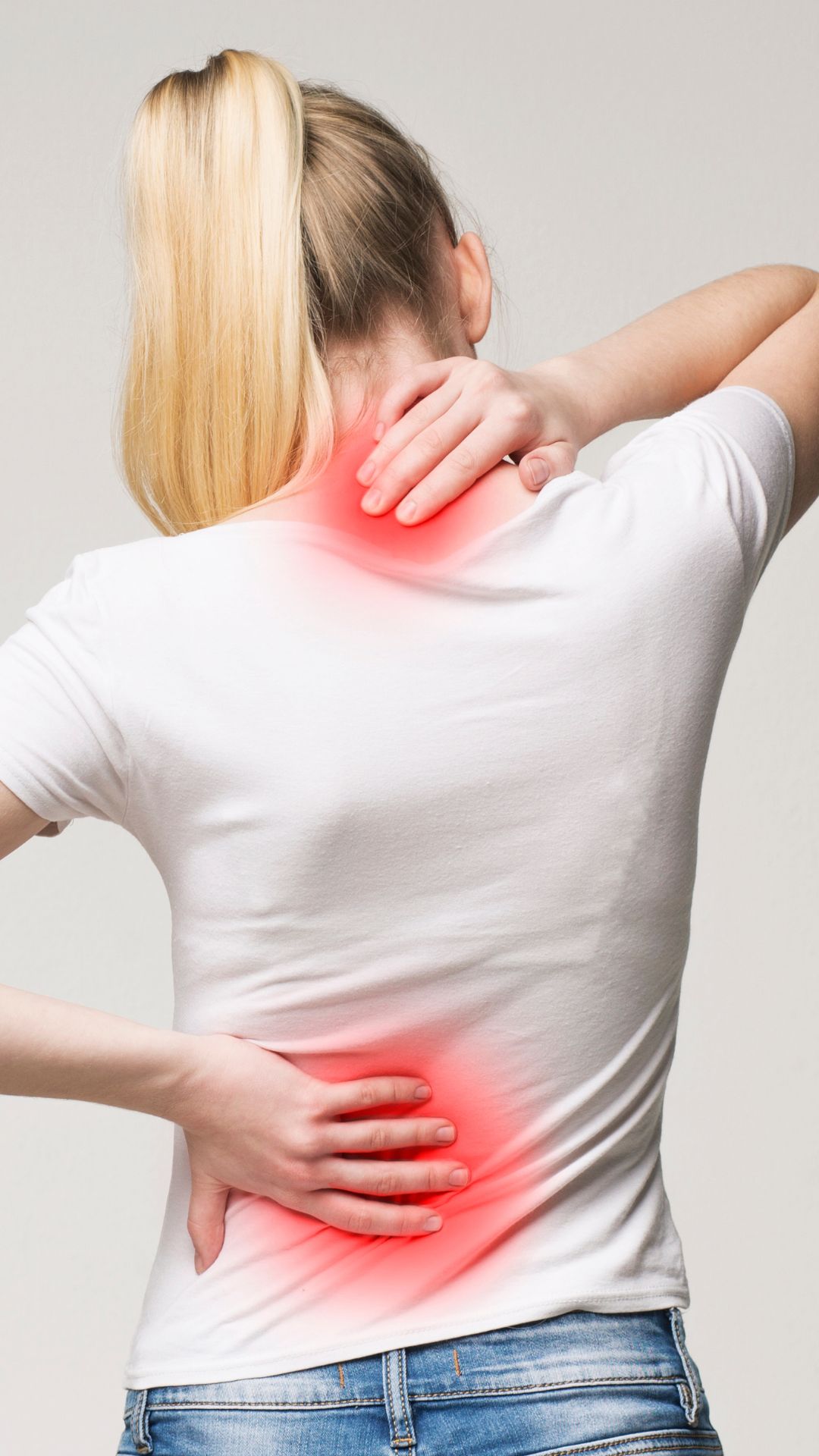 Woman holding her neck and lower back